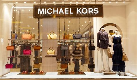 what company did michael kors buy|capri holdings limited brands.